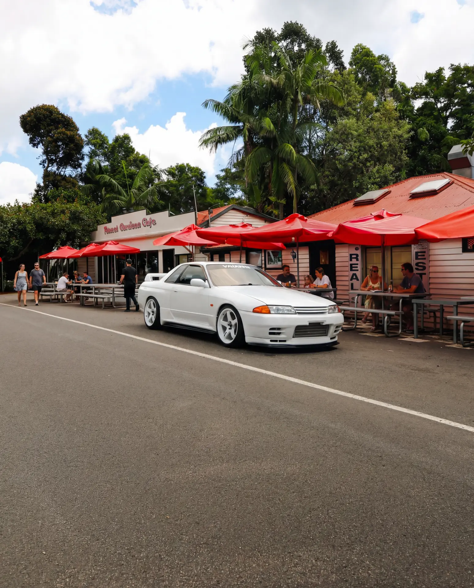 White R32 GT-R parked outside a country cafe